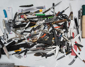 184 KNIVES AND 2 GUNS EMPTIED FROM KNIFE BINS