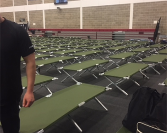 Officers forced to sleep on sports hall floor
