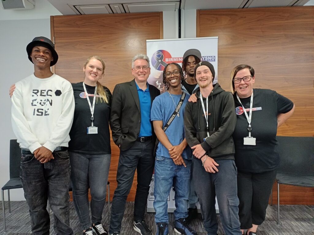 PCC Simon Foster with Birmingham Says No campaigners Rachel Warren and Dee Kelly and the beneficiaries from the Helping Communities Fund