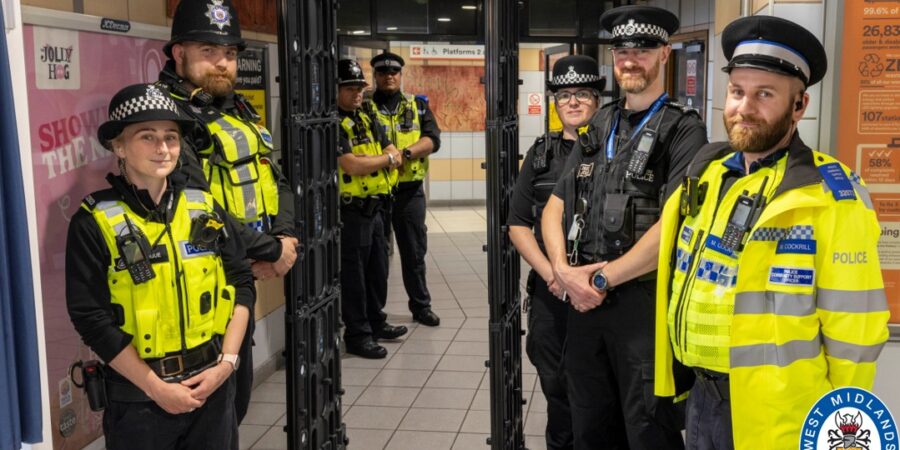 West Midlands Police, British Transport Police and Staffordshire Police officers with the new knife arch at Walsall train station